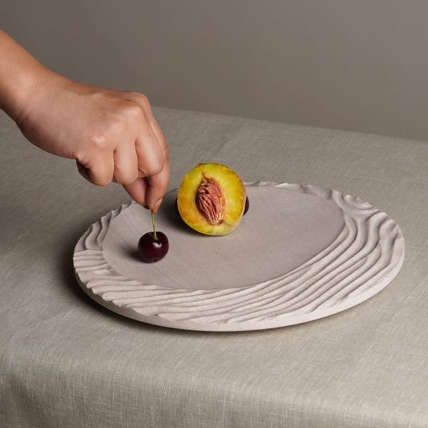 🔷 Rhythm in Stone.Introducing the Nami Plate by @borrowedearthcollaborative — a sculptural meditation on motion and stillness.Inspired by the rise and fall of ocean waves, its carved lines echo the sea’s gentle cadence—bringing fluidity and calm to any table or display.✨ Available in:🤍 Volakas — a marble with graceful veining and soft elegance📏 Size: Small💵 Price: $325.00📦 SKU: WM-CRPT-NM-S-VK-BEOEach piece is hand-carved from reclaimed stone, making every plate one-of-a-kind in veining, tone, and texture.Perfect for mindful gatherings or as a minimalist object of contemplation.DM to reserve your piece. Let form and flow meet on your table.#BorrowedEarth #NamiPlate #OceanInspiredDesign #VolakasMarble #StoneCraft #ArtOfStillness #MindfulObjects #DesignWithDepth #PrecisionStone #ModernOrganic