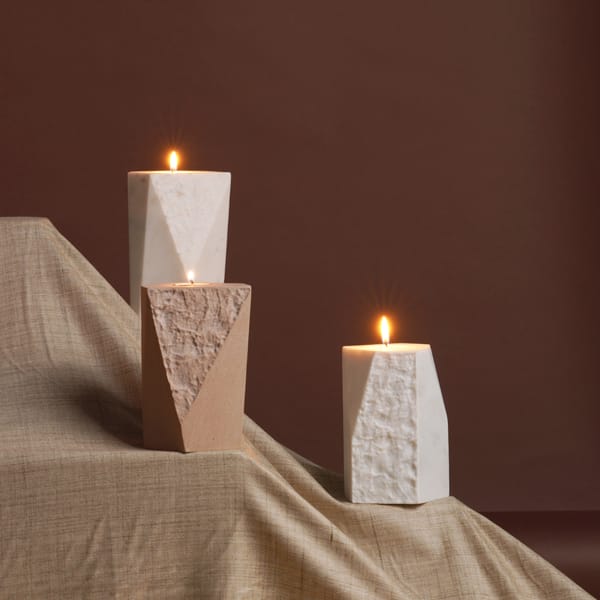 🔷 Carved by the Earth. Lit by Intention.The Linea Candle Stand by @borrowedearthcollaborative is a sculptural study in contrasts—merging fractured textures with sharply hewn geometry.Each piece balances the ancient tactility of stone with the elegance of human design, evoking harmony between the natural and the intentional.✨ Available in four earthy colors:🤍 Taj White🪨 Travertine🏜 Beige Sandstone🌫 Grey Fantasy📏 Sizes: Small, Medium, Large💵 Price: $175.00 – $275.00📦 SKU: WM-CNSD-LIN- -TB-BEO♻️ Sustainably crafted from reclaimed stone, no two are ever the same—each one shaped by time, texture, and light.Whether you use it to anchor a dining table, adorn a shelf, or accompany meditation rituals, Linea brings presence and purpose.Browse the collection or DM us to reserve your favorite color and size. Stone has never looked this soft.#BorrowedEarth #LineaCandle #StoneDesign #ModernRituals #TravertineDecor #GreyFantasy #TajWhite #MinimalSculpture #CandleLovers #PrecisionStone